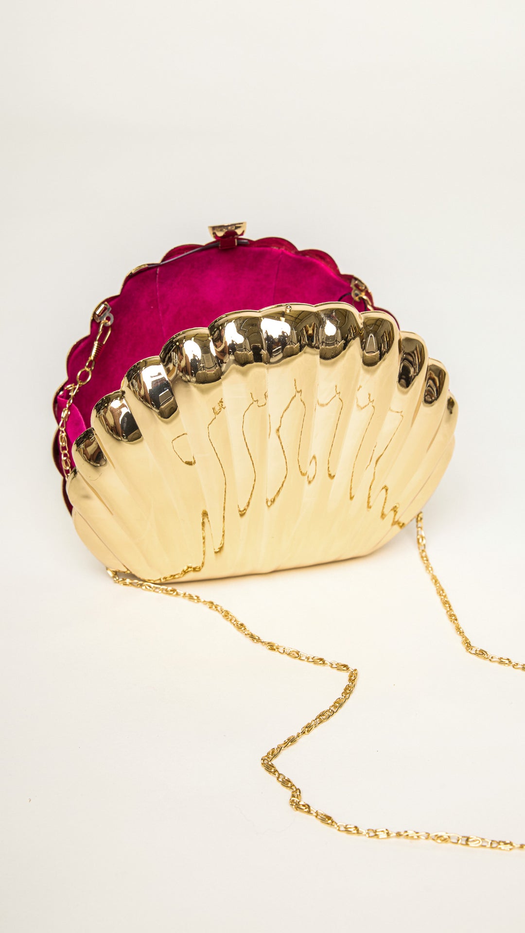 Shelly Shell-Shaped Gold Clutch