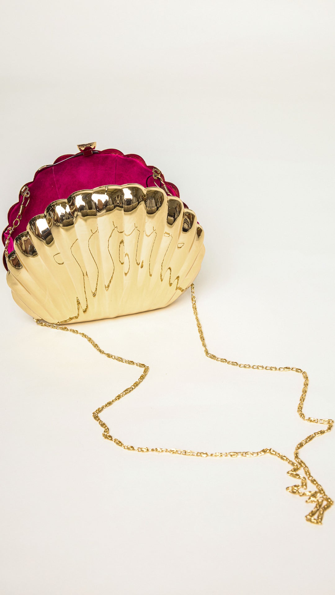 Shelly Shell-Shaped Gold Clutch