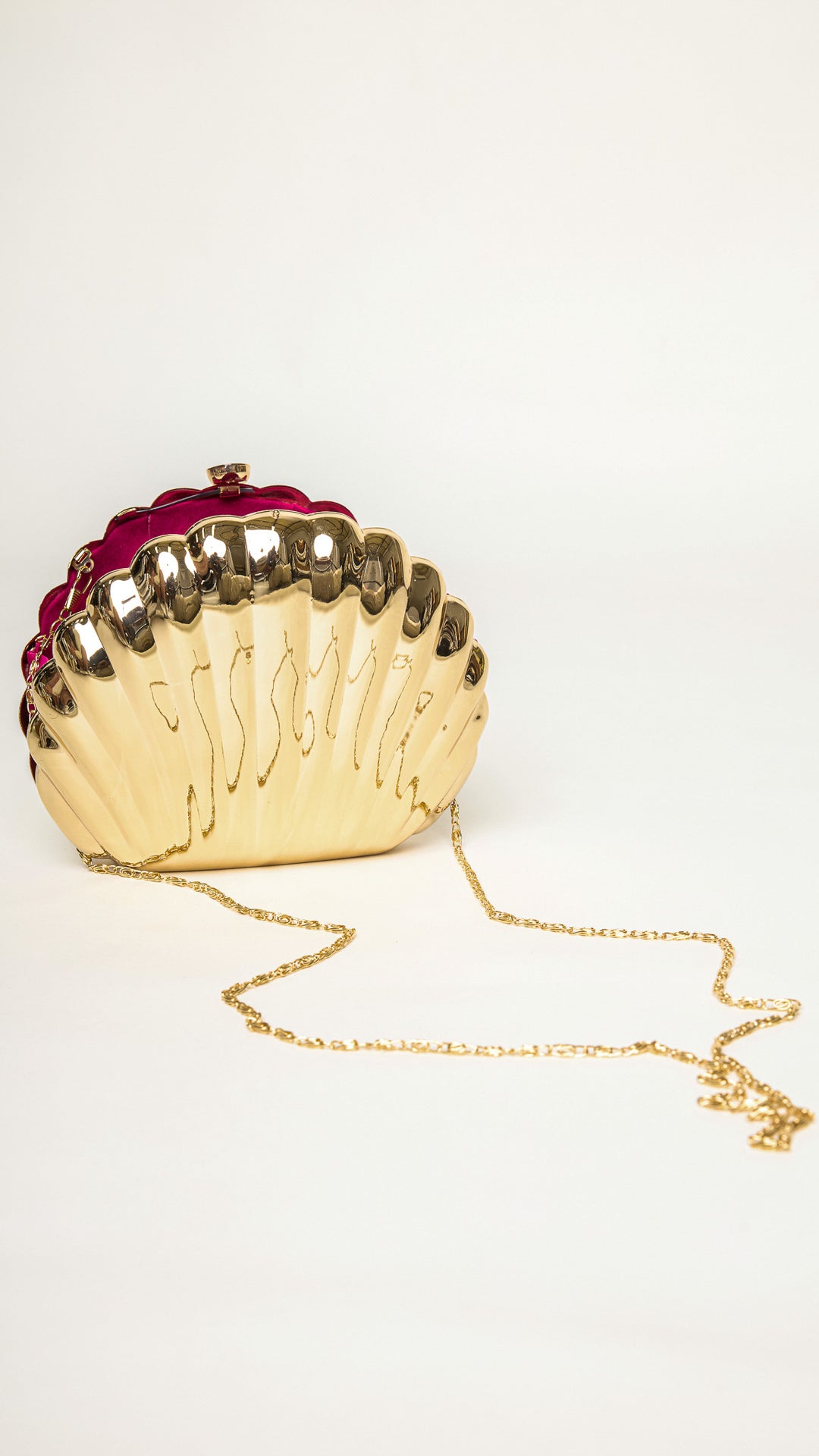 Shelly Shell-Shaped Gold Clutch