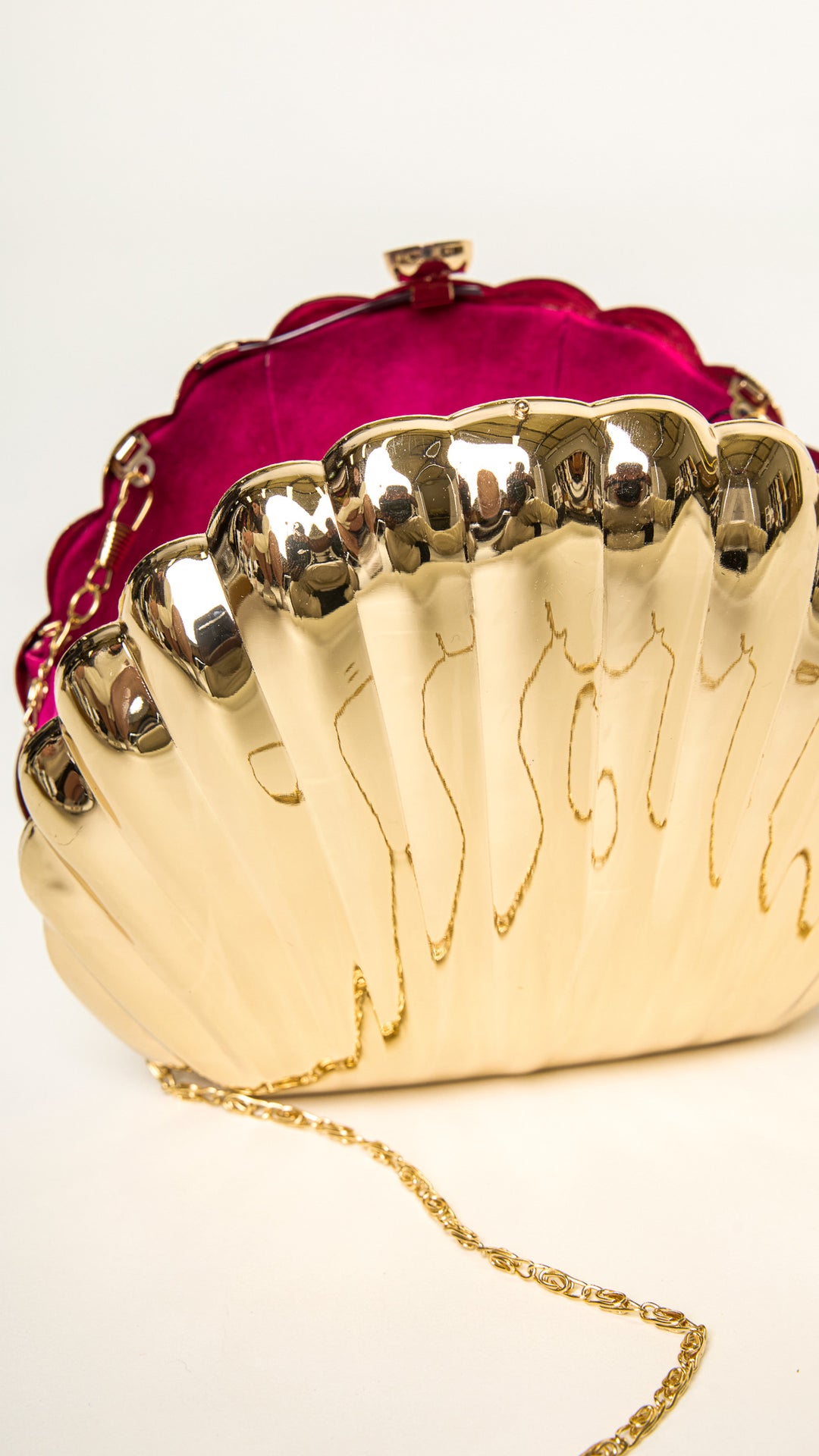 Shelly Shell-Shaped Gold Clutch