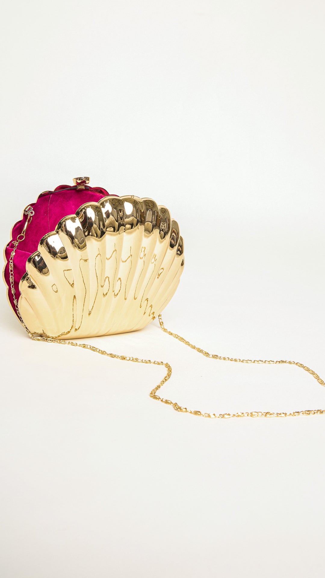 Shelly Shell-Shaped Gold Clutch